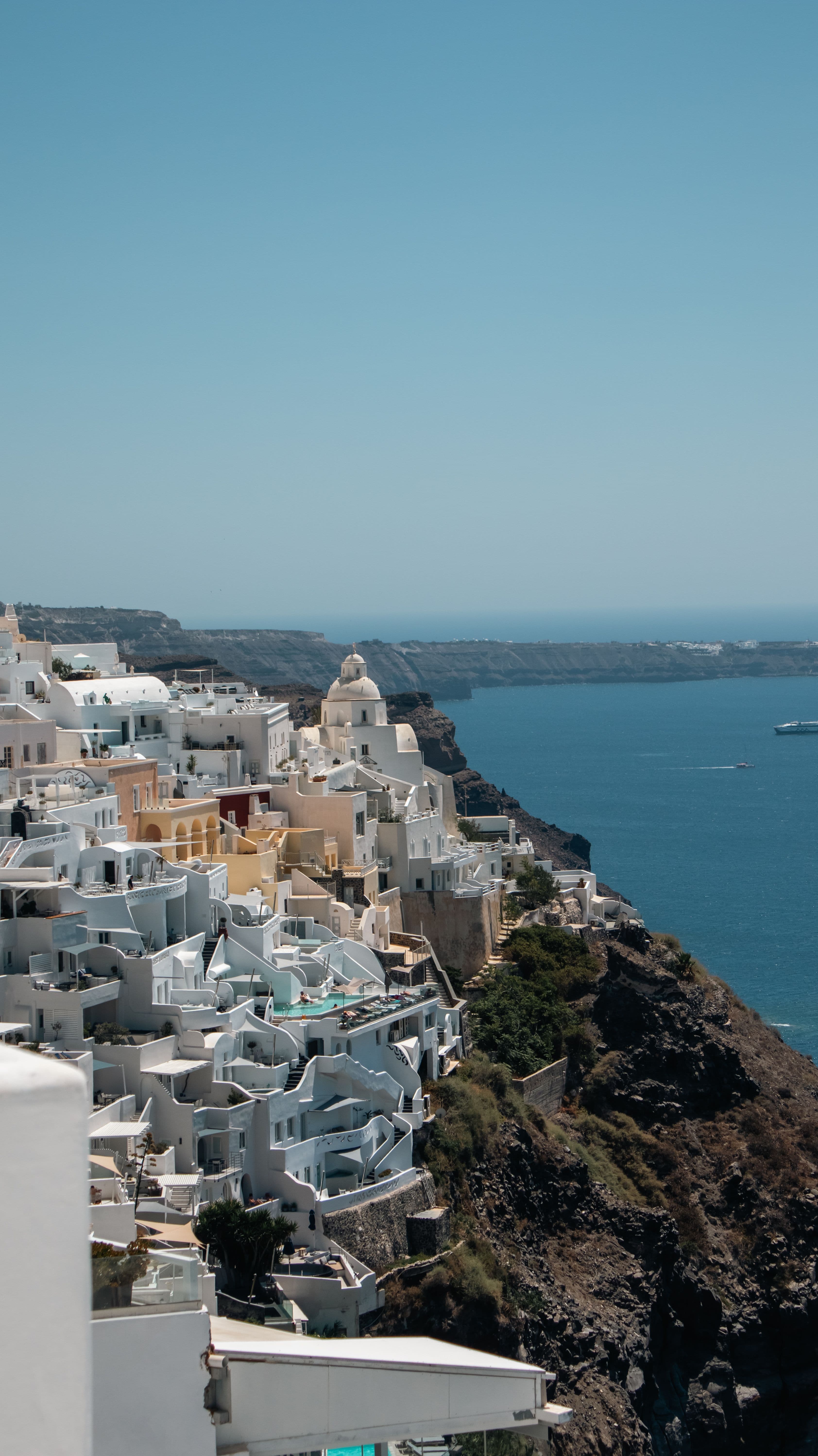 White clifftop village overlooking the Aegean Sea